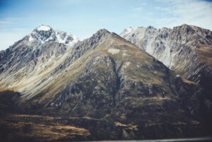 A mountain range with a lake in the background.